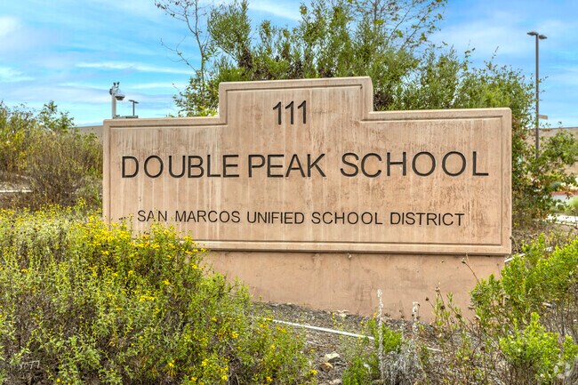 The monument of the Double Peak K-8 in San Marcos.