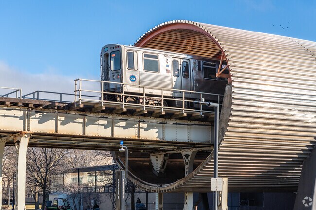 The CTA train passes through the tunnel above the student center at IIT in Stateway Gardens.