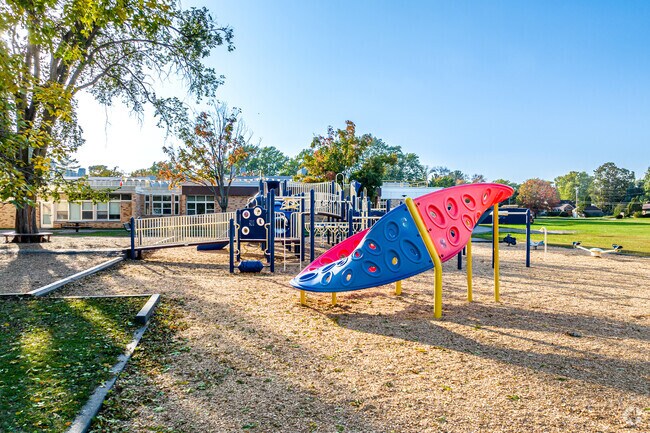 The Falcon Heights playground features creative play structures.