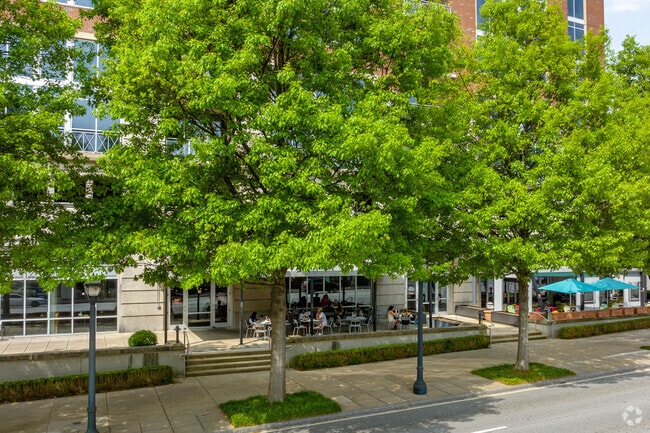 Patrons dine in covered outdoor seating at Egg Harbor.