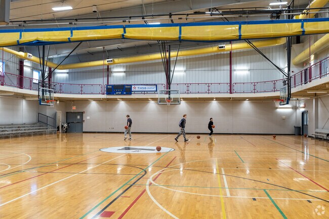Shoot hoops at the YMCA open gym in central Brazil.