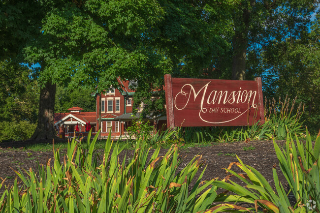 Mansion Day School sign and building in Woodland Park.