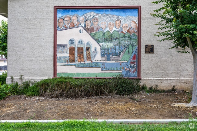 Magnolia Elementary School's front wall mural unveils its vibrant character for all to admire.