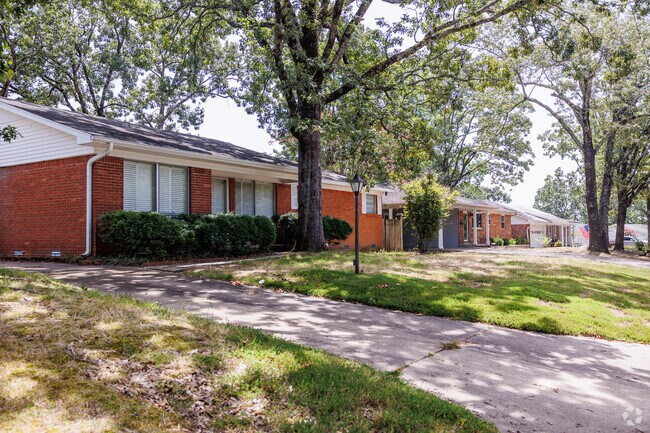Amboy homeowners enjoy shaded lots with large trees.
