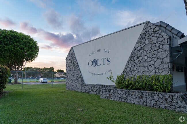 Another Calusa Preparatory logo at sunset.
