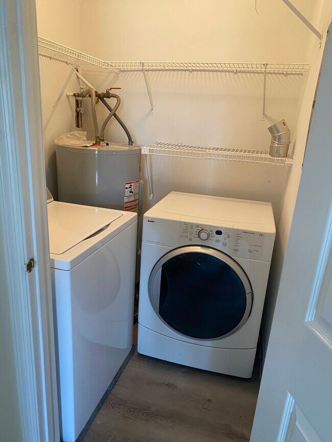 Utility room with washer and dryer