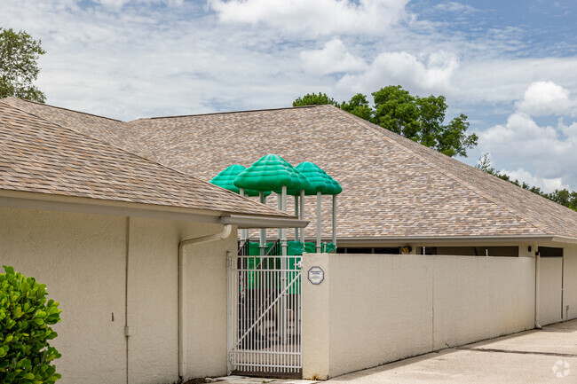 The Able Academy in Naples has a small playground amongst the classroom buildings.