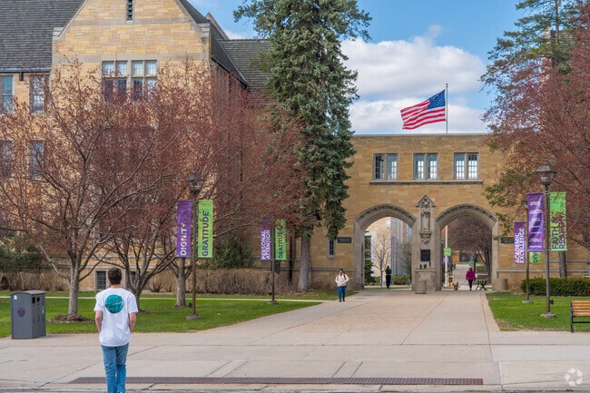 Students walking through the campus mall at St Thomas University.