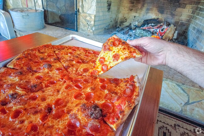 Enjoy a fresh pizza by the hot fire at Critters Outdoor Pizza in Social Circle.