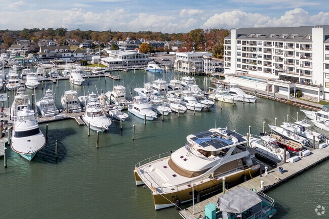 Large fishing boats and yachts in Rudee Inlet near Bay Colony-Cavalier Park.