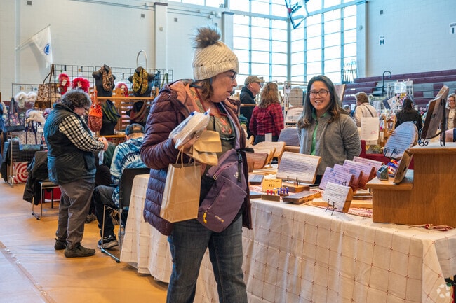 Vendors happily display their work at the Cape Cod Tech's Annual Holiday Craft Fair.