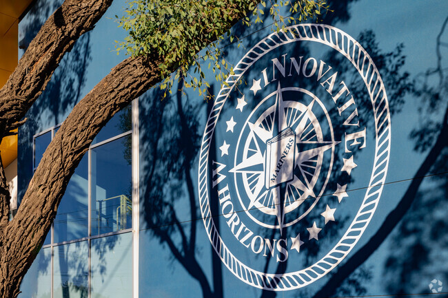 School logo is seen on the exterior building at Innovative Horizons Charter School in Perris.