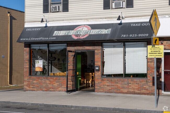 Thin-crust pizza is a favorite at L Street Pizza.