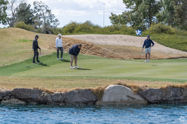 Residents of East Las Vegas go golfing at Desert Pines Golf Club.