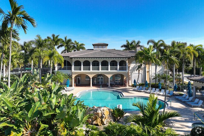 View of the pool and back of the clubhouse in Heron Bay.