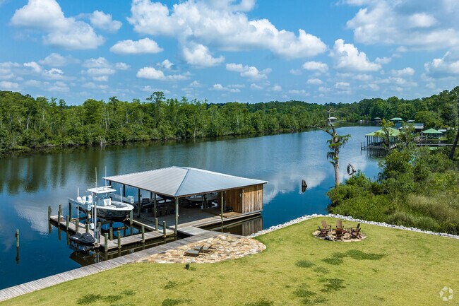 Cypress Shores locals can be found joyfully boating and fishing on the river.