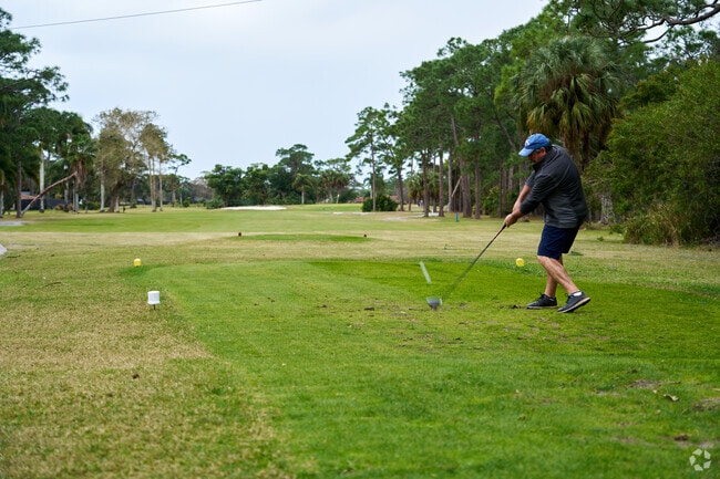 Play some golf at publicly accessible Island Pines Golf Club in Lakewood Park.