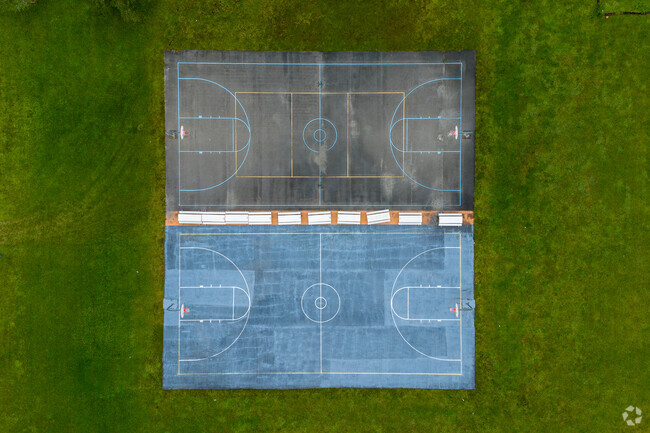 90 degree look down of the Archbishop Coleman F. Caroll High School basketball court.