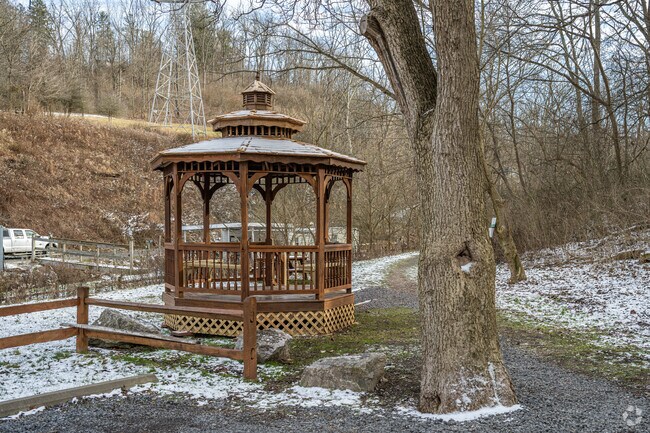 Take a break and have a seat in the gazebo at Kane Woods Nature Area.