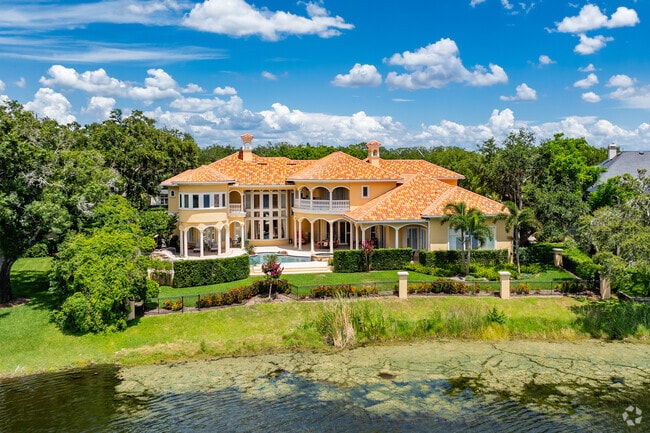 Avila homes display beautifully landscaped grounds all around the home.