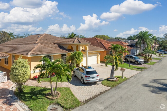 Discover Spanish-style row homes in Coral Springs.