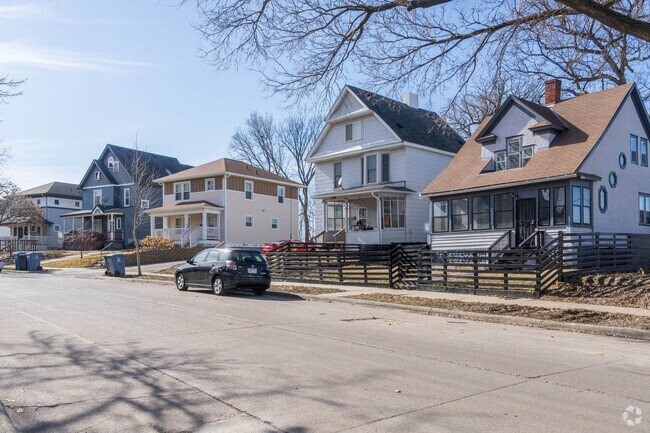 A row of various styles of homes in the Jordan neighborhood of Minneapolis.
