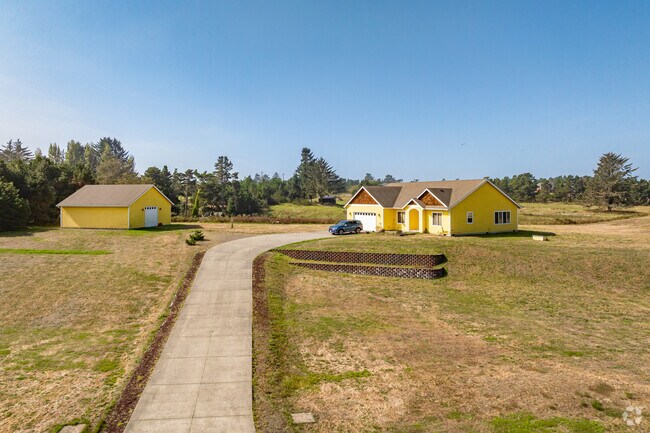 Find homes with acreage lots and long drives at Surf Pines.