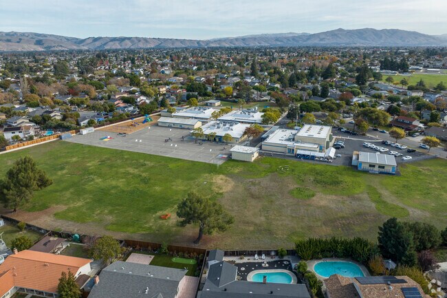 Kennedy Elementary School has a large field for play and sports activities.