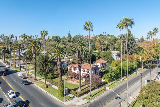 Sidewalks and palm trees line most streets in Home Gardens.