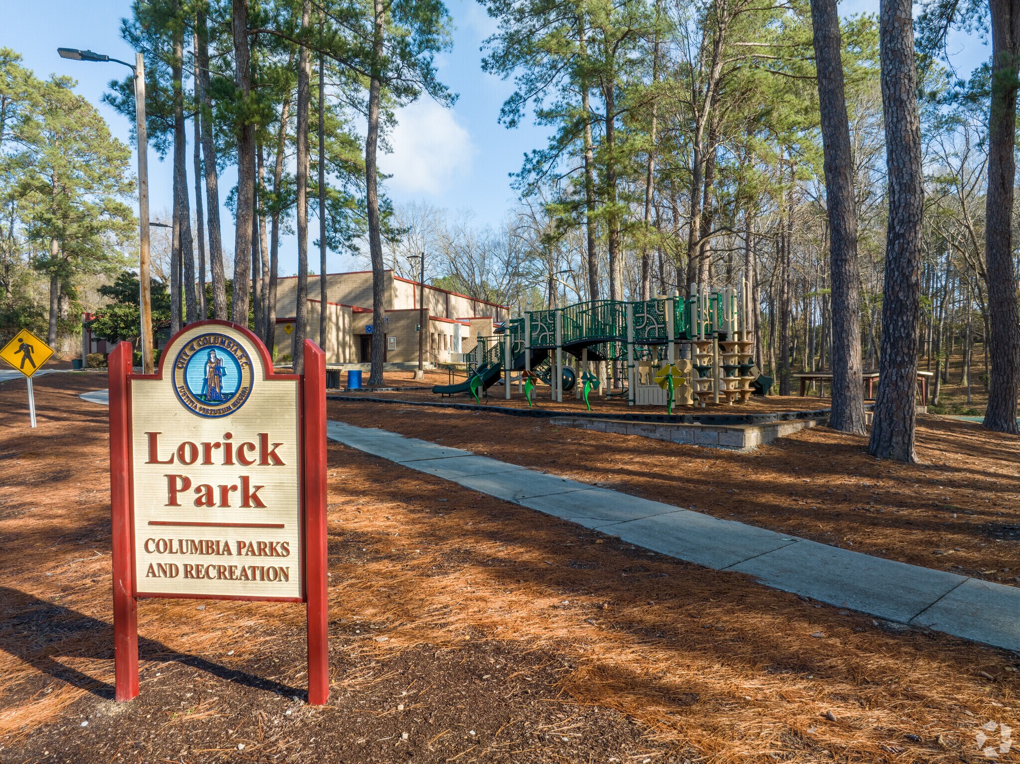 Signage adn playground in Background Lorick Park