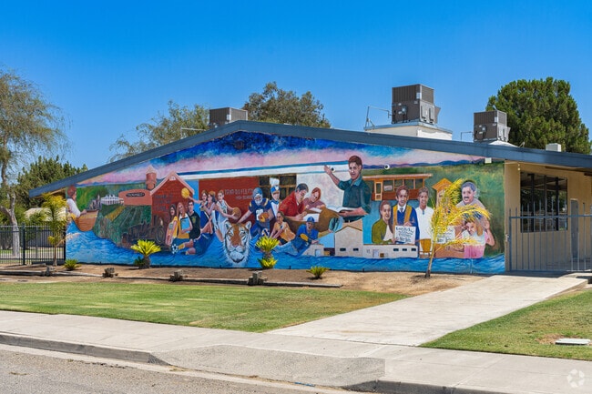 A large colorful mural is featured on one of the Tranquillity High School buildings.