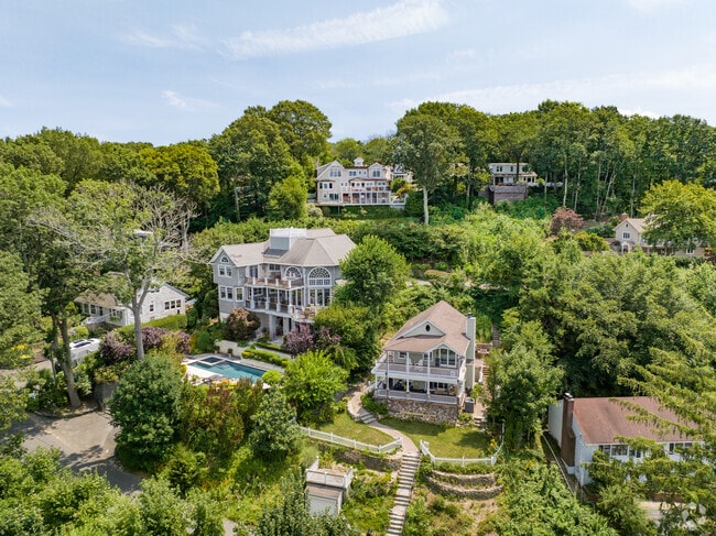 Beautiful Colonial homes sit in the hills of Laurel Hollow.