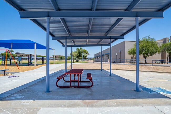 Covered tables provide a convenient space for gatherings at Sweetwater School in Phoenix.