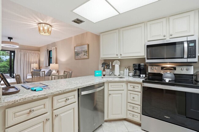 600 Neapolitan Way unit FL1-ID1073549P, Naples, FL 34103 - photo 6