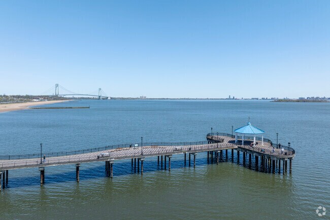 Nearby, the Verrazano-Narrows Bridge connects Midland Beach to Brooklyn and Manhattan.