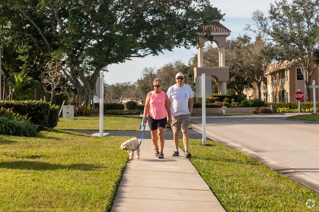 Cypress Lake residents enjoy relaxed sunny mornings walking around the neighborhood.