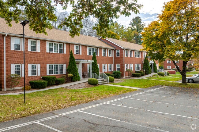 Downtown apartments on Judson Ave have mature trees, convenient parking, and town walkability.