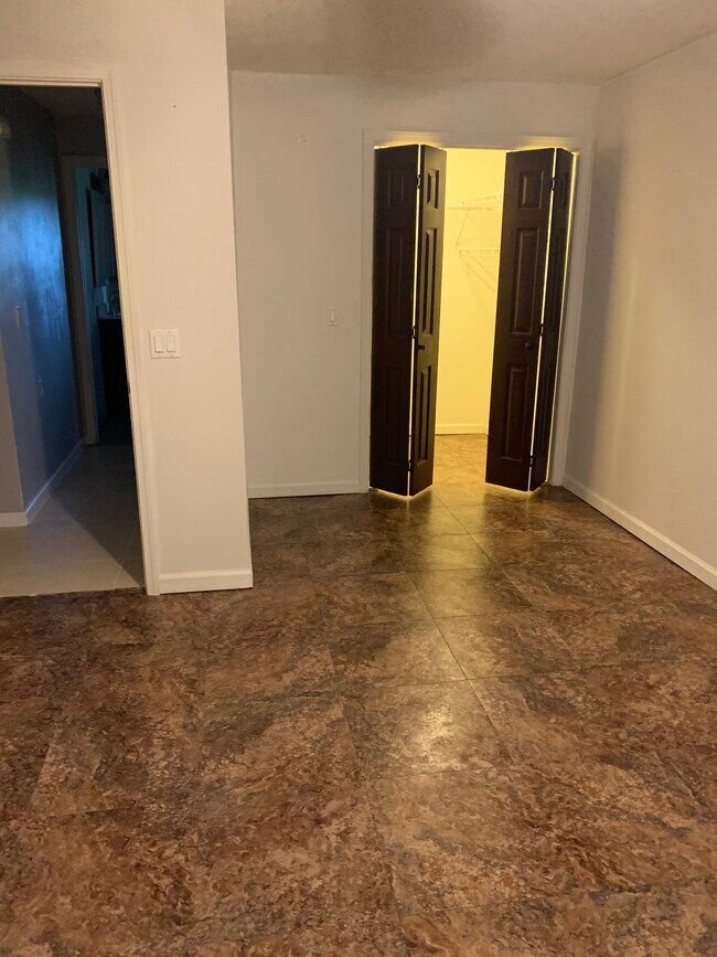 BEDROOM WITH WALK IN CLOSET
