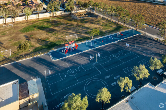 Kids love to play basketball at recess at Palms Elementary School in Perris.