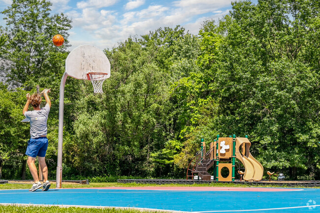 Work on your shot on the new basketball courts at Shining Star Park.