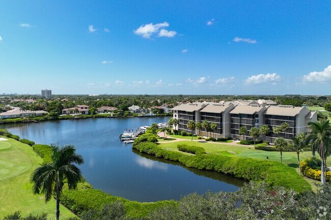 Condominiums cluster near Jonathan's Landing Golf Club fairways.