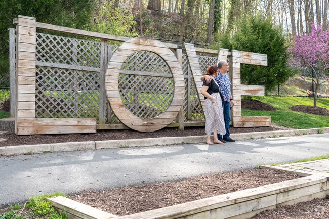 An Occoquan couple is seen in front of the 