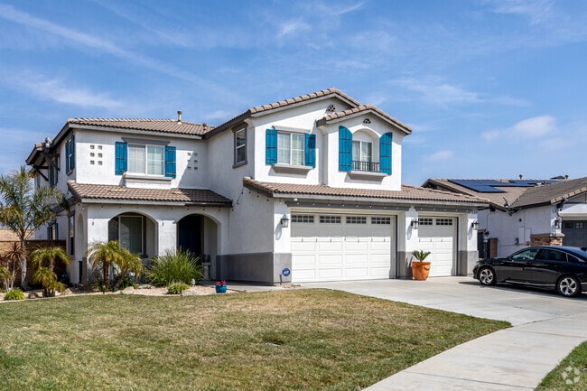 A big, multi-story home with blue windows located in Citrus Heights.