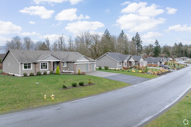 Discover the allure of Woods Creek with these exquisite homes.