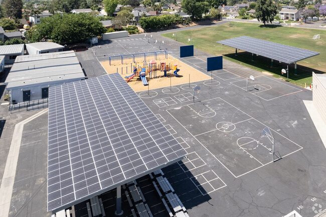 Solar panels make for a green school around the playground at Sunset Lane Elementary, Fullerton.