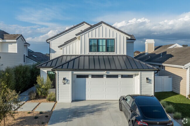 Some homes in Beacon Hill have undergone renovations, such as this modern Cape Cod-style home.