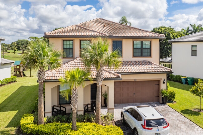 Beautiful new construction homes in Woodmont in Tamarac, FL are perfect for new families.