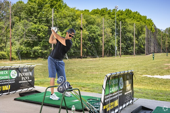 Practice your swing action at the Essex Golf Center, a public driving range.