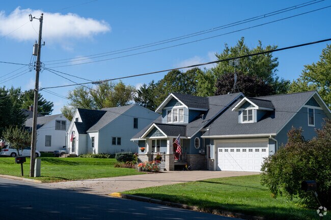Modest Ellsworth cottages and bungalows sit near schools, parks, and Main Street.