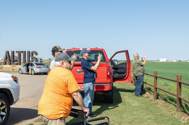 Locals of Altus gather near the Air Force Base to get a view of military craft taking flight.